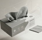 Gray microfiber rags in a transparent dispenser box on a light gray background