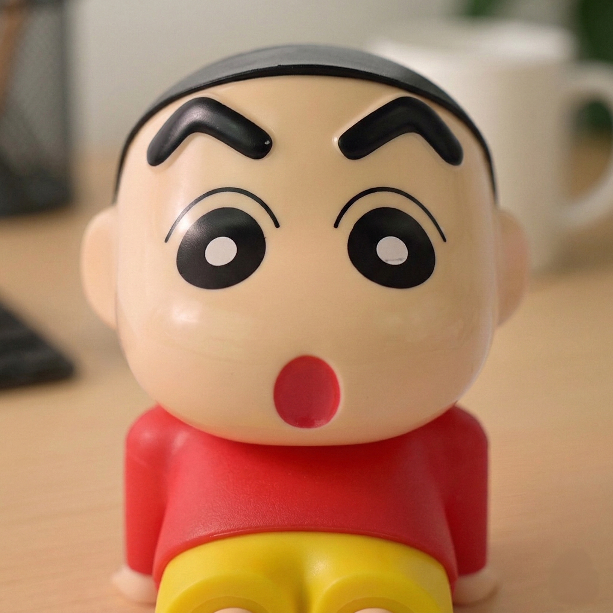 Shinchan Sitting Figurine – Cute Anime Desk Decor & Collectible Toy